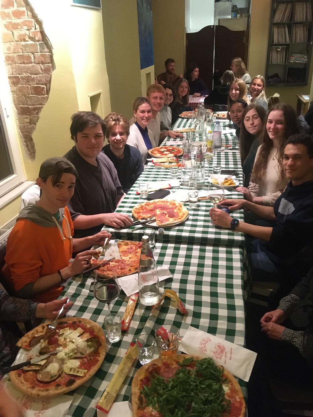 JYM students enjoying pizza in Berlin