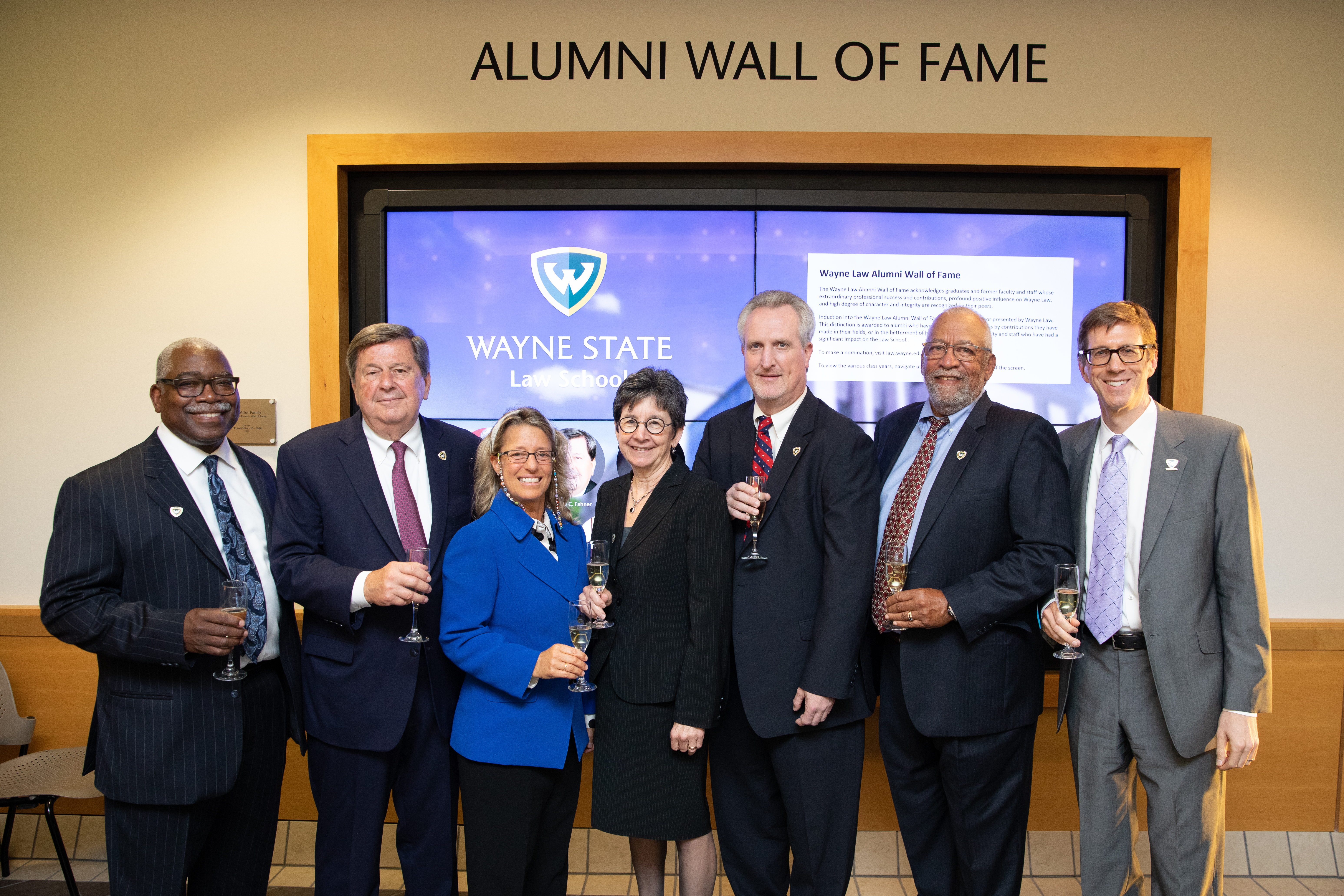 Inductees stand with Dean Bierschbach and Judge Edward Ewell Jr.