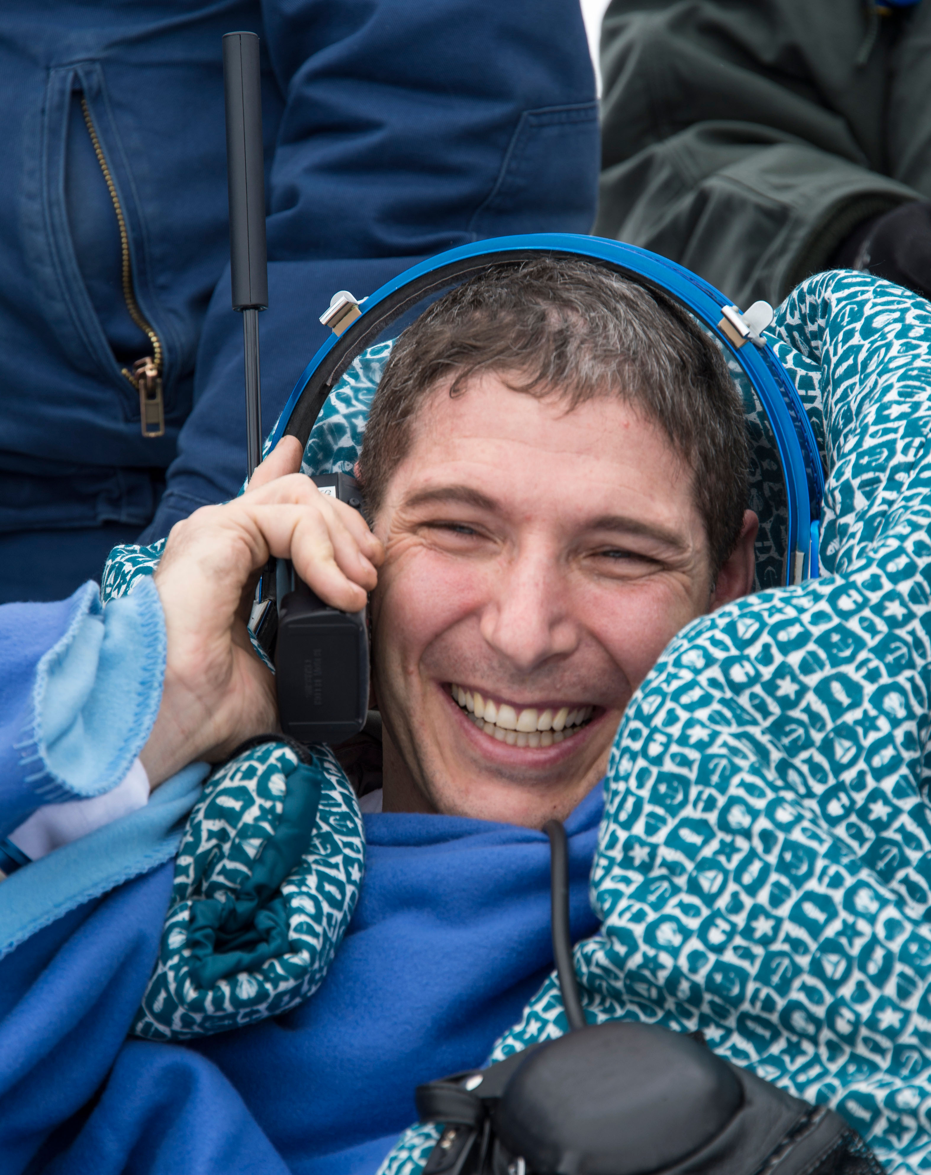 astronaut on satellite phone