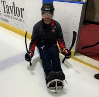 Andrew Moul at sled hockey practice