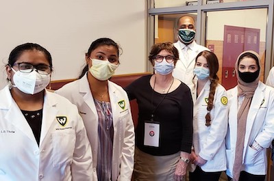 Incoming P2s Niharika Thota, Sruthi Thomas, Johnie L. Bailey, Shahad Zaytouna and Hoda Fotovat with CEO of MedNetOne Health Solutions and WSU alumna Ewa Matuszewski.