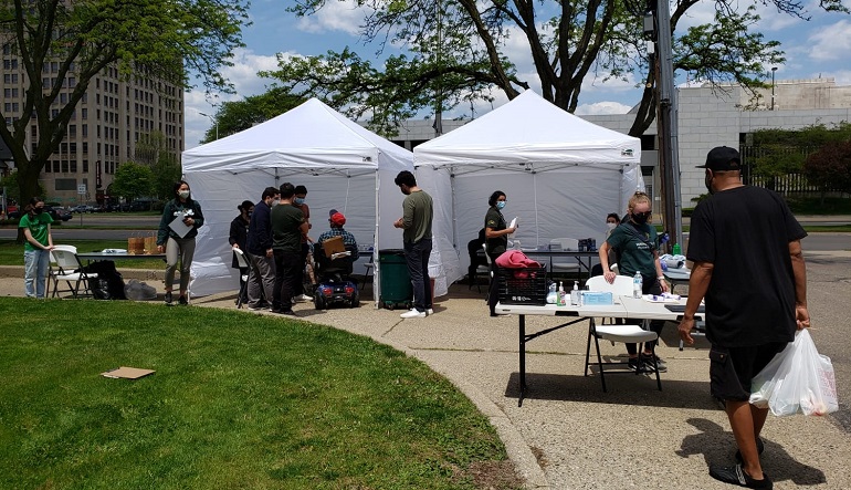 tents outside set up for health care screenings