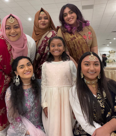 Farzana with family at a wedding