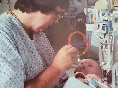 Carol Wiley with a young OT patient