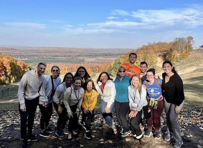 Jennifer Dickson with students and alums