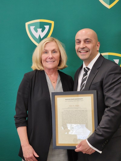 Dr. Moh H. Malek (right) with Health Care Science Chair Diane Adamo  at Wayne State's Academic Recognition Ceremony.