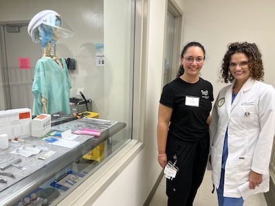 Student Sam Matthews and PAA Program Director Lou Kramer during the Mortuary Science Building Open House