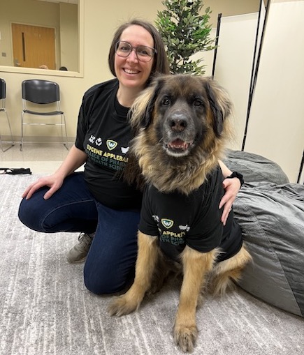 Professor Christine Kivlen and therapy dog Stella