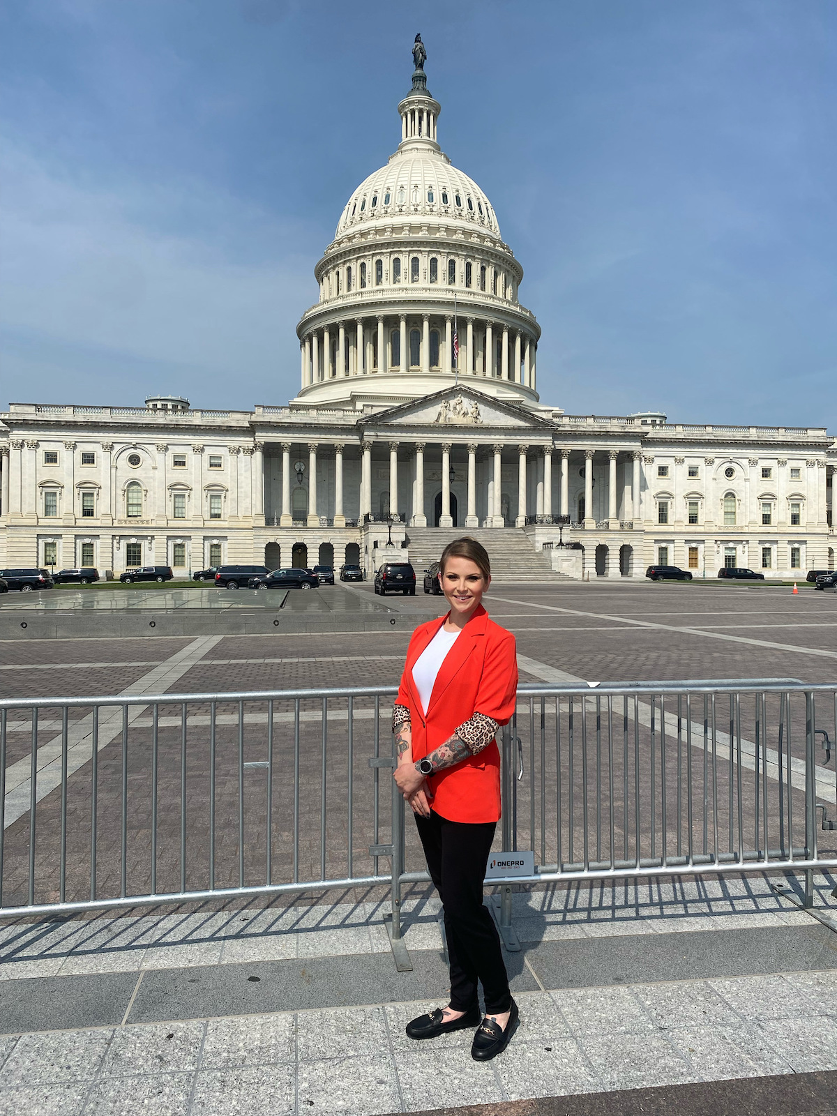 Student Amber Kelly stands in front of the Washington D.C. Capitol Building