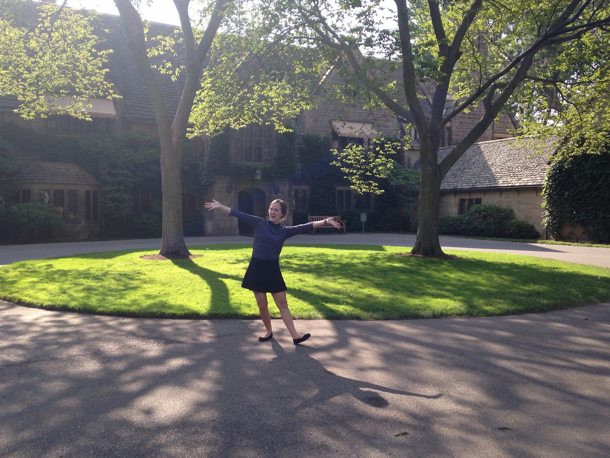 History student Andrea Ozanich poses in front of the Edsel & Eleanor Ford House