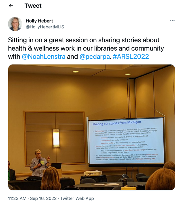 A screen capture photo of a Tweet that features an image of SIS Assistant Professor Christine D'Arpa presenting at the ARSL 2022 conference.