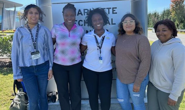 Last October, Ashley Jones (left) was one of four STEAM Sports Foundation scholars who had the opportunity to participate in an immersion tour of the Charlotte Motor Speedway during a race weekend. (L-R) Kimberly Betty, Kettering University; TaiJaune Robinson, Design Release Engineer, GM Motorsports; Tanya Andres, Universal Technical Institute; and Taya Dinkins-Goldsmith, Oakland University.