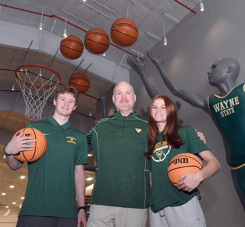 Andy Ayrault, a former WSU player and current assistant women's basketball coach has come full circle with his twins, Adam and Annabel, who are now playing for the Warriors.