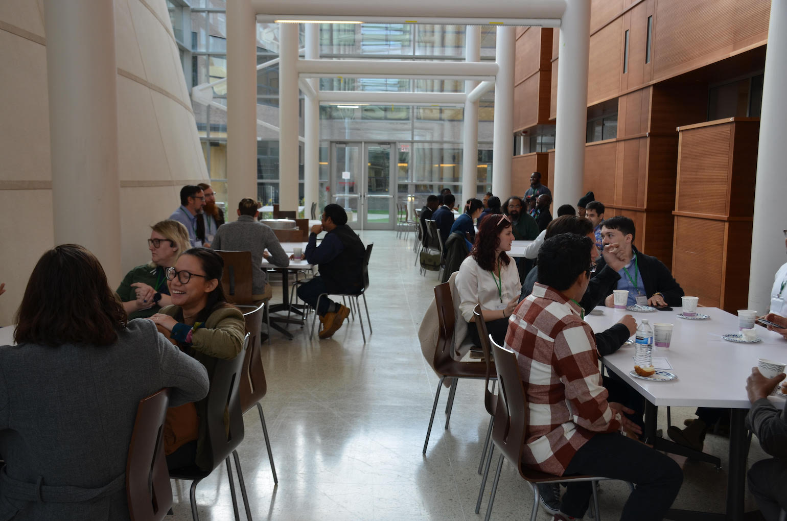 attendees take a lunch break at the symposium