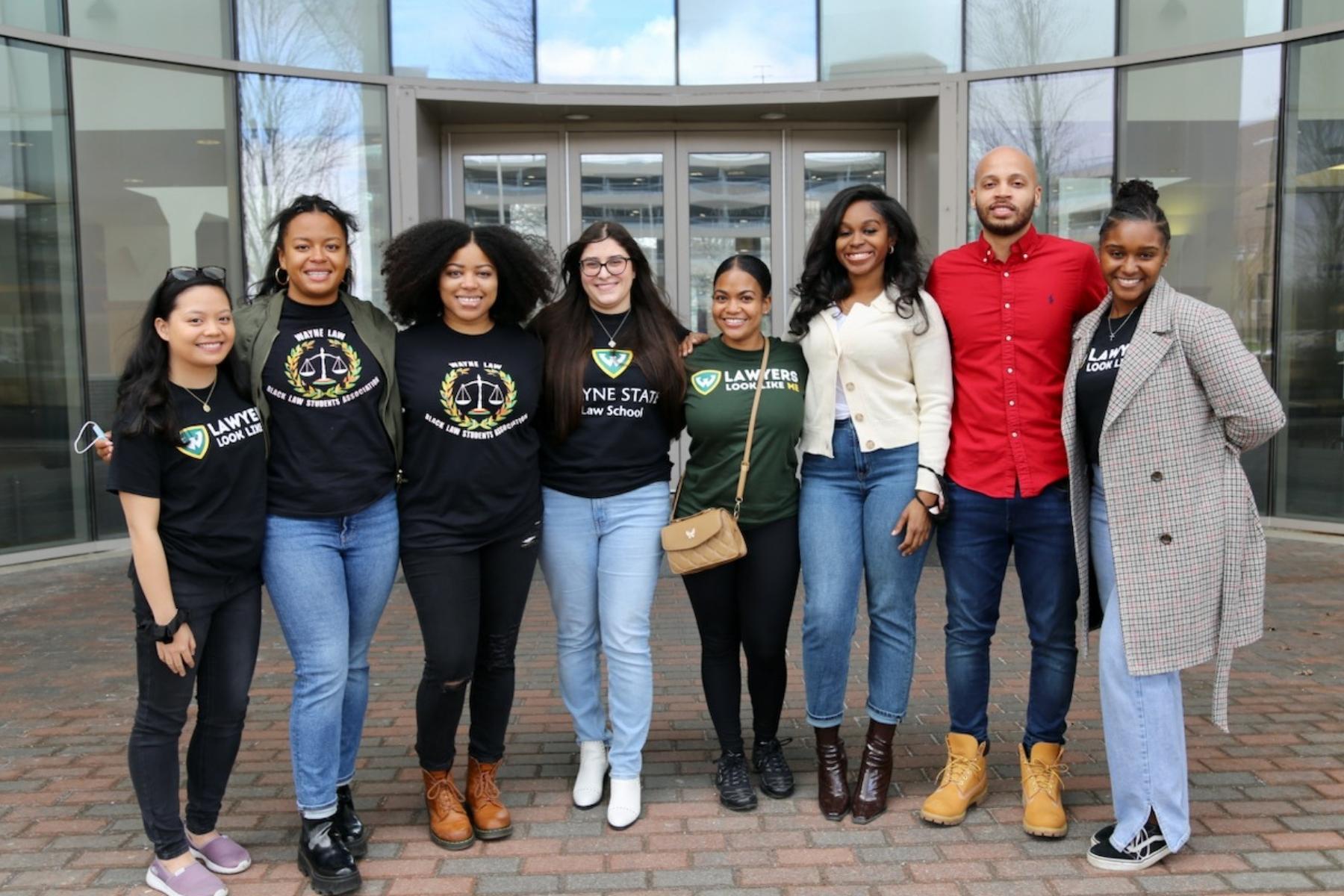 Organizers and volunteers from the Black Law Students Association pose for a photo outside Wayne State University Law School