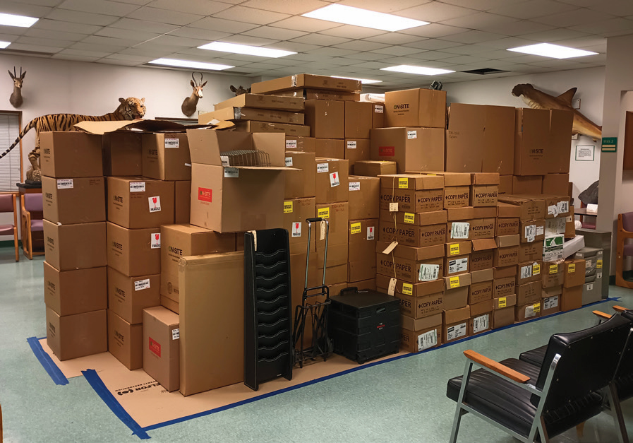 Boxes packed up in the center of the room