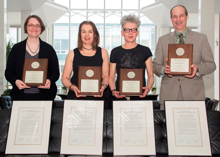 Jaime Goodrich, Chris Tysh, Renée Hoogland, Wayne Raskind, dean, College of Liberal Arts and Sciences, accepting for Jorgelina Corbatta