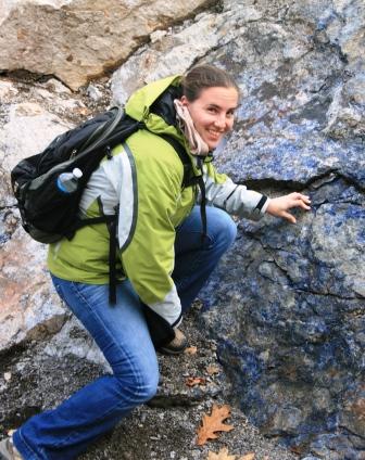Sarah Brownlee climbing on a rock