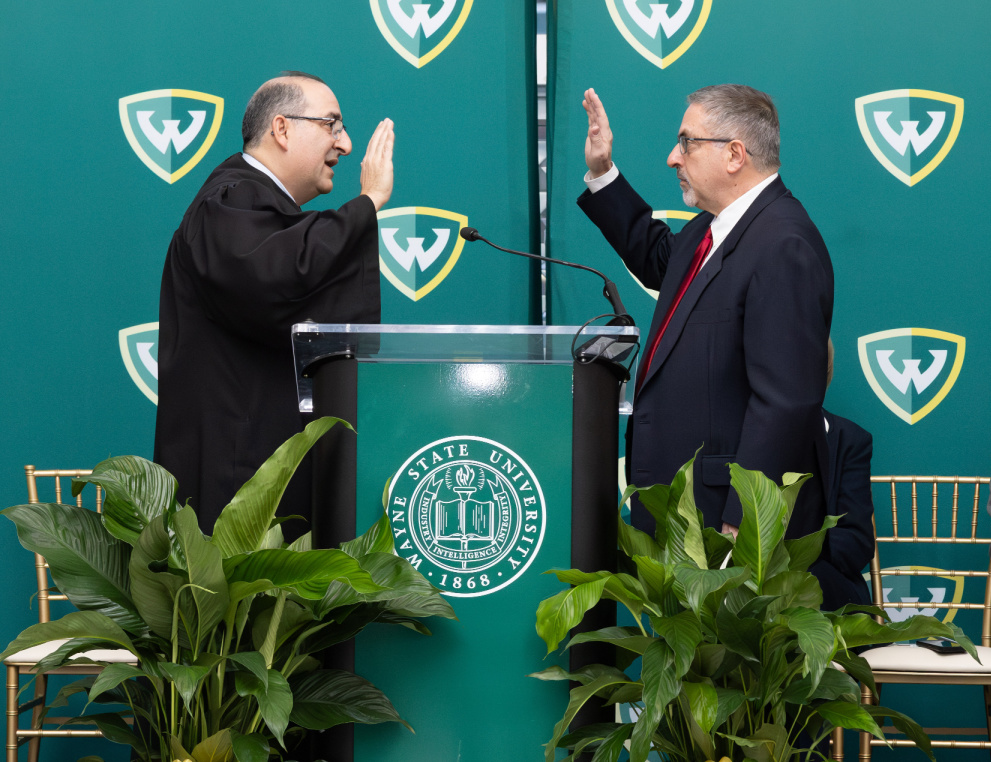 Governor Michael Busuito takes the oath of office following his re-election to the Wayne State University Board of Governors.