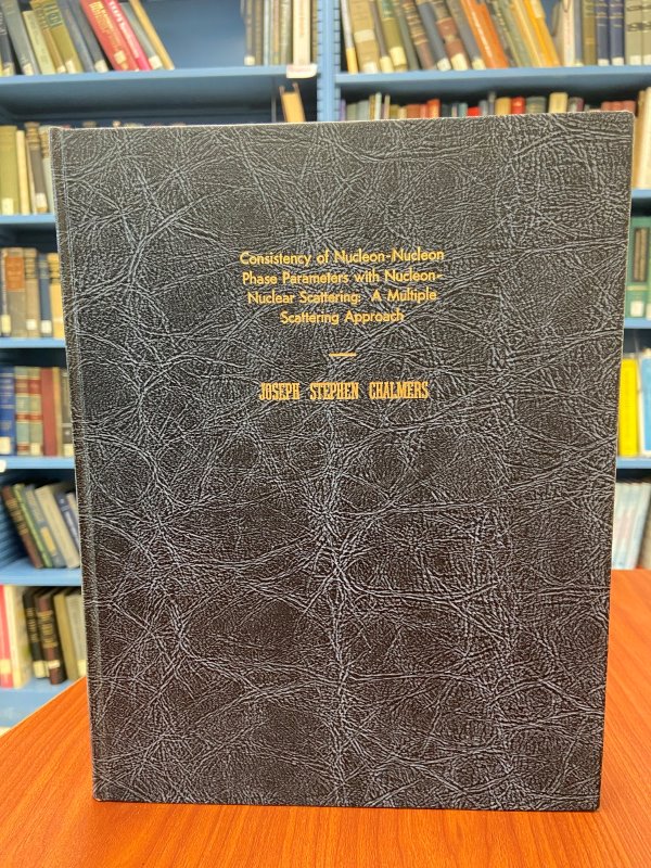 Cover of Dr. Chalmers's PhD dissertation with bookshelves in the background