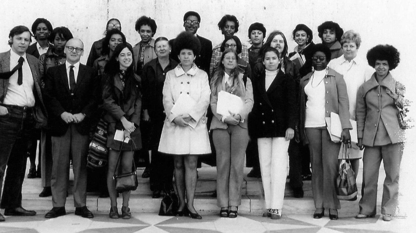 A black and white photo circa 1972 of the program cohort and its directors.