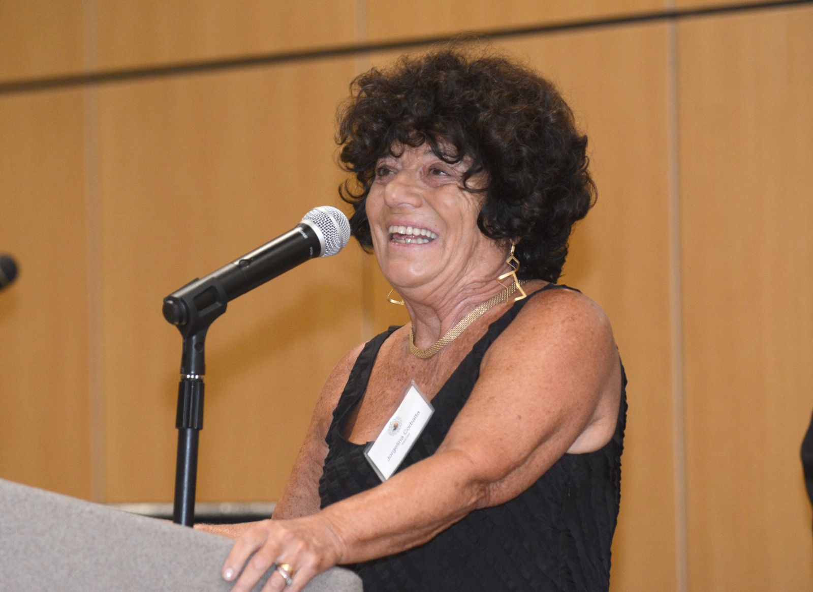 Professor Jorgelina Corbatta at the podium