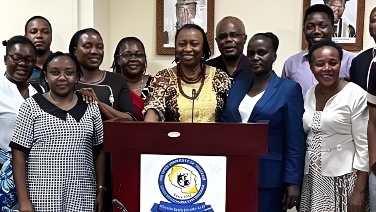 Daphne Ntiri with faculty in Tanzania