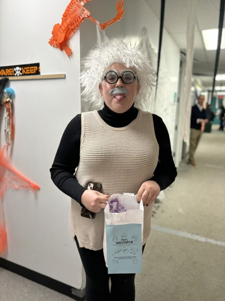 Faculty member in Albert Einstein costume