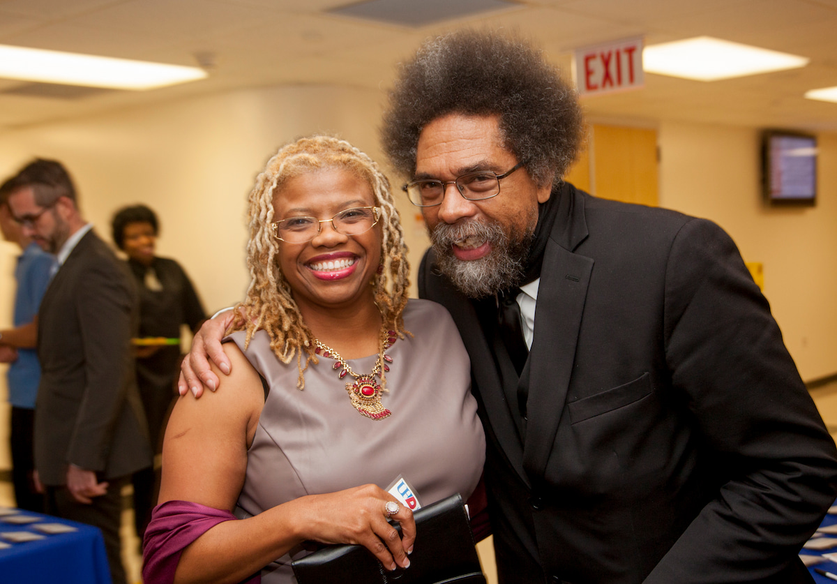 Fulton (left) with Dr. Cornel West