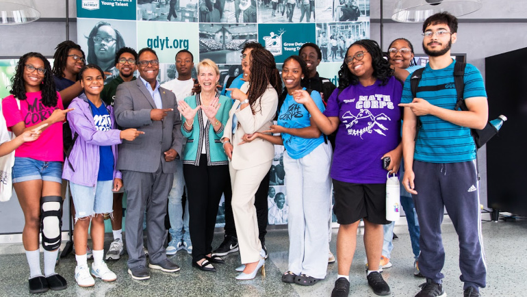 'Grow Detroit's Young Talent' students pose with Detroit Deputy Mayor Todd Bettison, left center, Wayne State University President Kimberly Andrews Espy, Ph.D., and GDYT's Director of Operations Misty Evans, after launching the program's 10th summer.