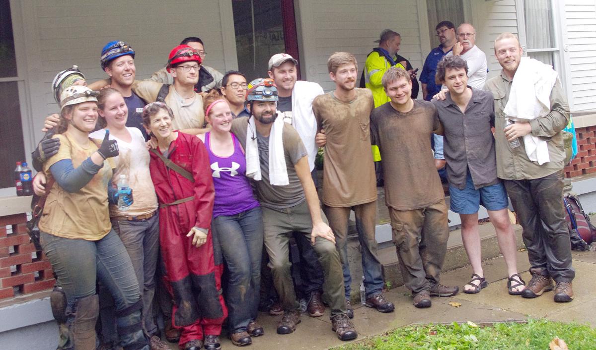 Geology students who were on a field trip to Hidden River Cave in Horse Cave through Clemson University and had become stranded inside the cave due to flooding posed for a photo after being rescued.