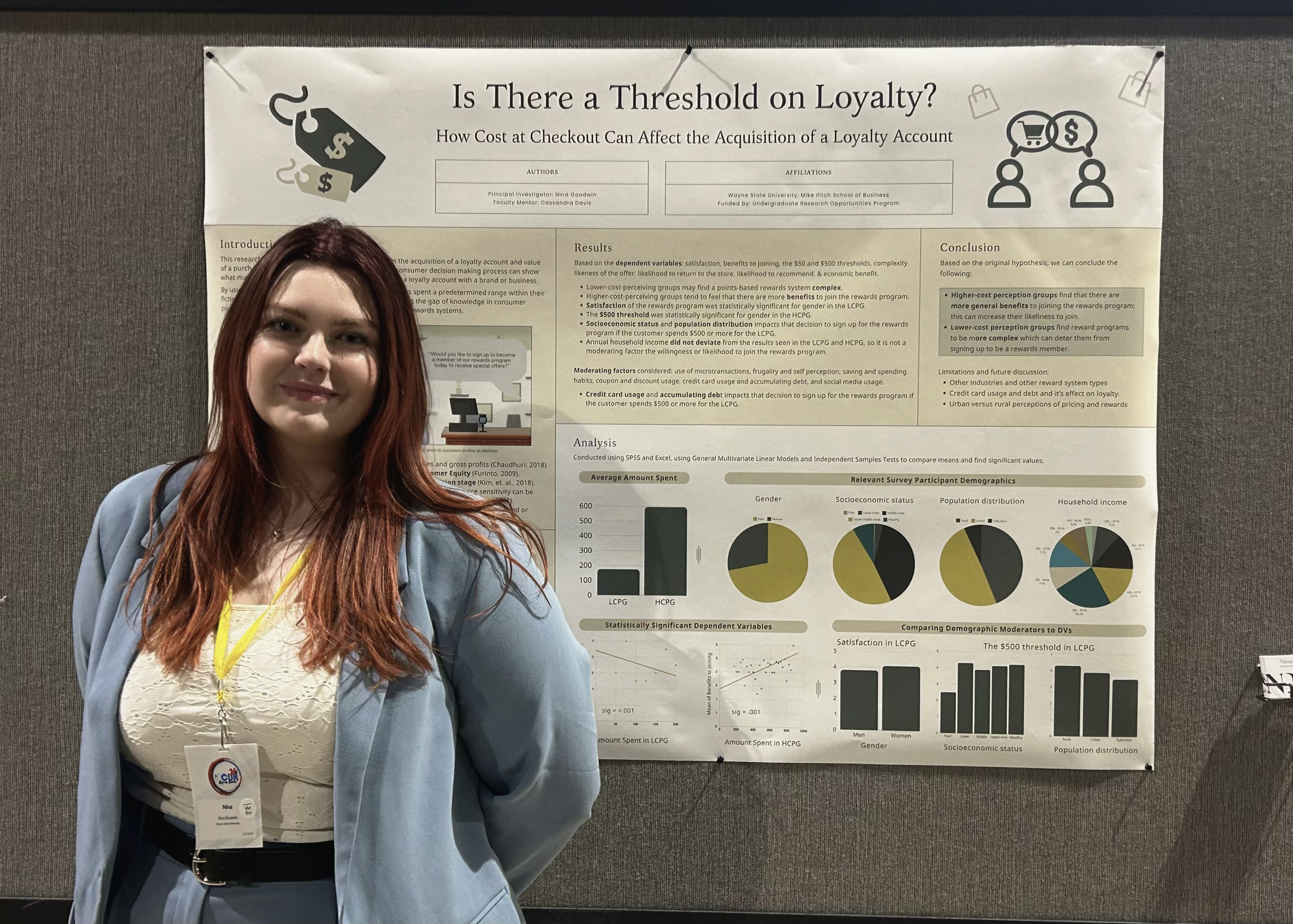 Woman standing in front of a poster