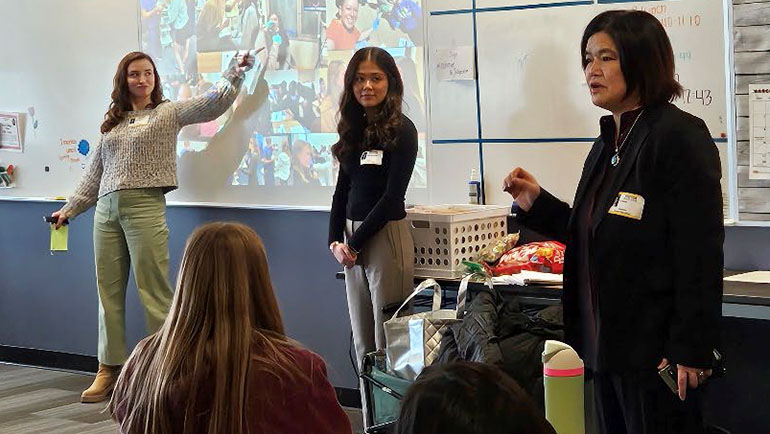 Dr. Li Hsieh (right), with CSD students Emily Felstow and Joelle Stempnik, presented on disease mechanisms and treatment in audiology and speech-language pathology to 35 Romeo High School students in February.