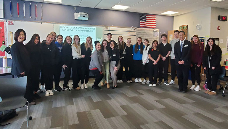 Dr. Li Hsieh and Dr. Jinsheng Zhang and CSD students Emily Felstow and Joelle Stempnik provided students at Romeo High School with hands-on experience in audiology and speech-language pathology.