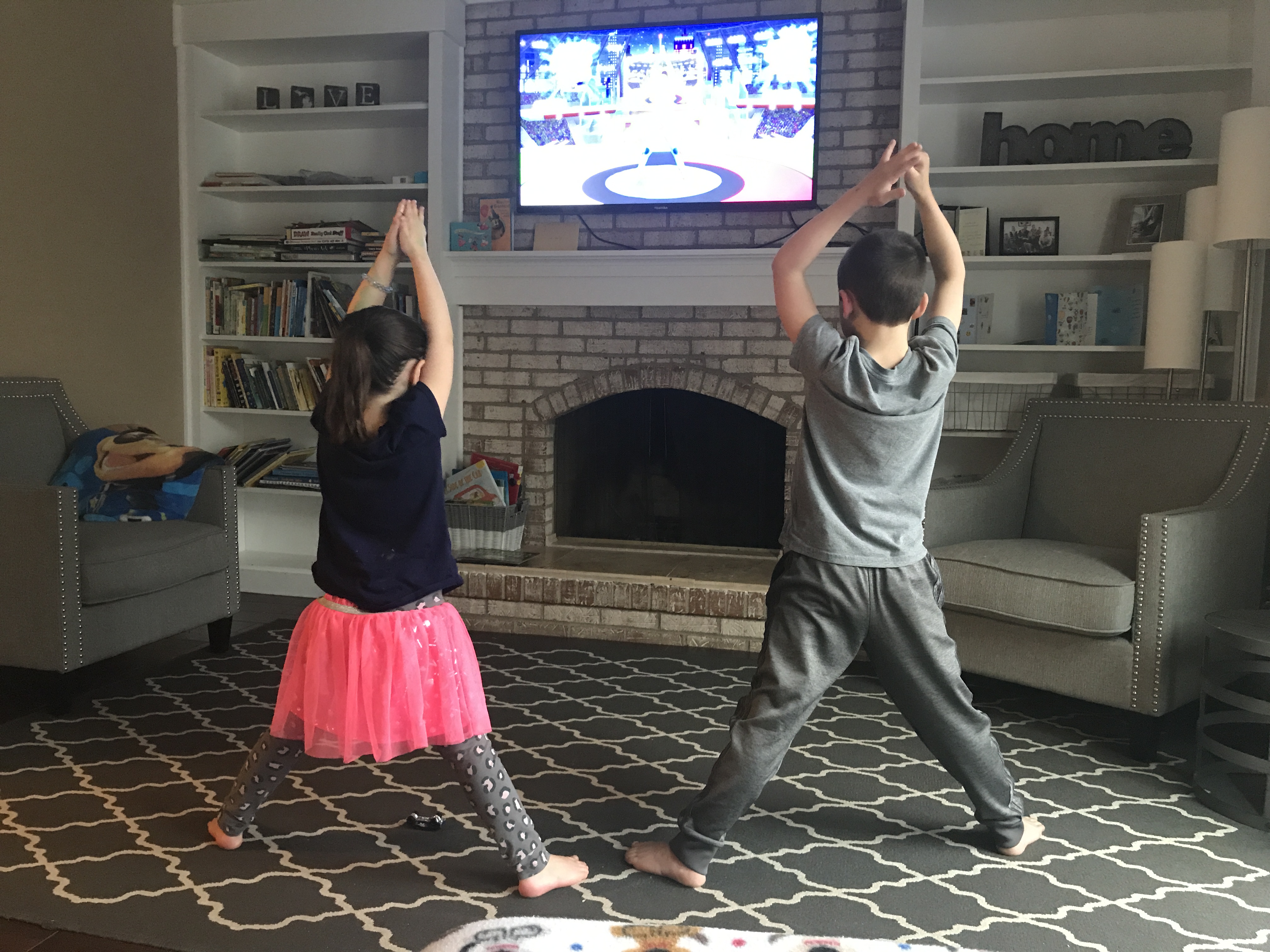 Kids doing yoga at home