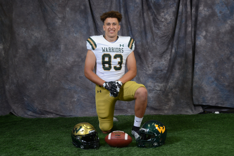 Michael Ramirez poses for a photo in his Wayne State football uniform.