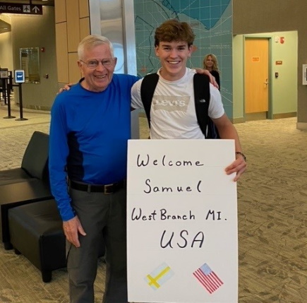 Kenneth Kish and exchange student Samual at airport