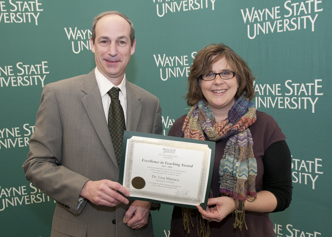 Dean Wayne Raskind and Associate Professor Lisa Maruca
