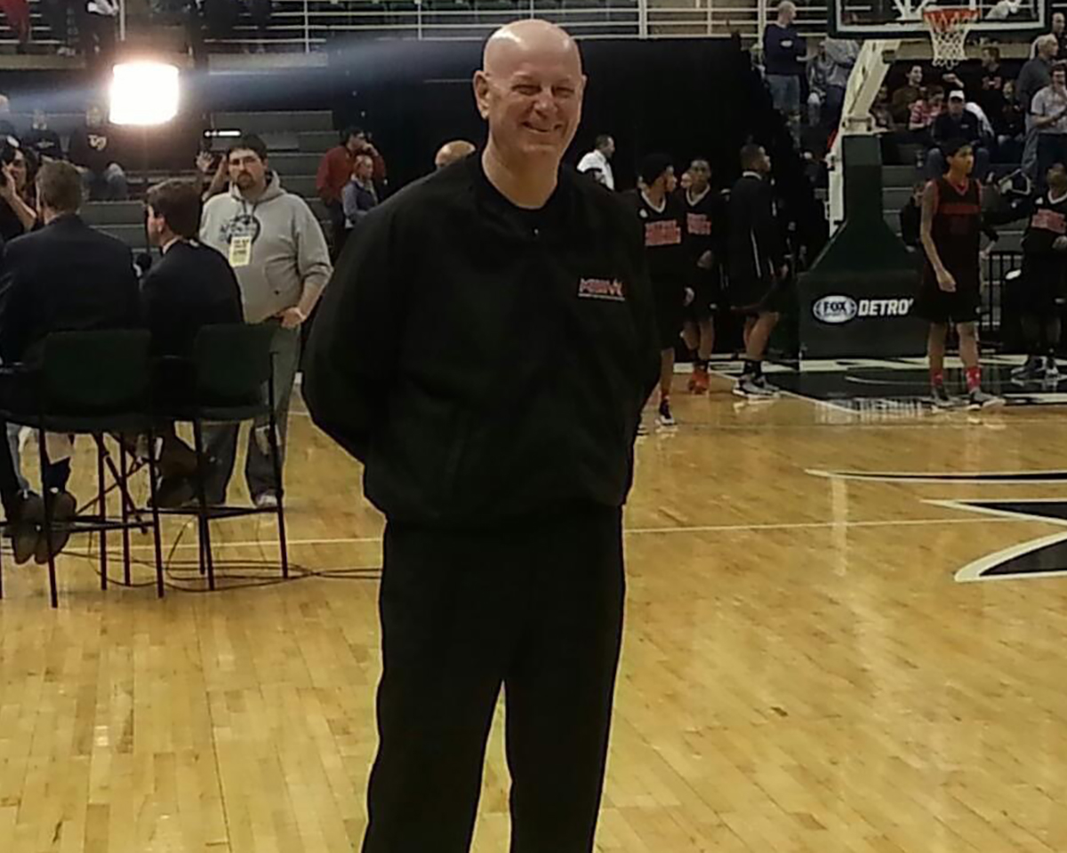Rick Massa has worked a total of eight MHSAA finals in football and basketball. Here is smiles for the camera before the Class B boys' basketball finals at Breslin Center on March 23, 2013. In that game, Birmingham Detroit Country Day posted a 57-49 win over Detroit Community.