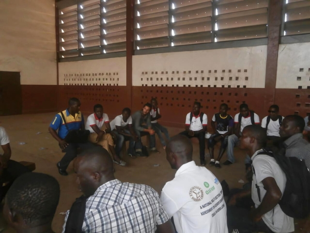 Michael Drasher leads a meeting during his anthropological fieldwork in Sierra Leone