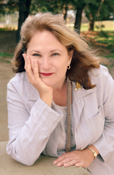 Michele Valerie Ronnick outside with hair in the wind