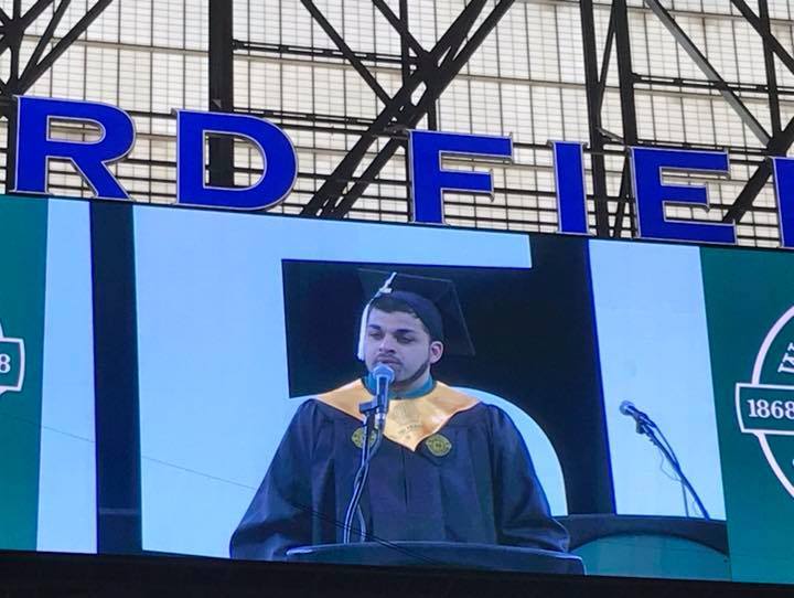 Mohammad giving commencement speech at Ford Field.