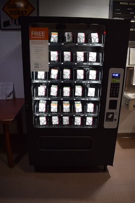 A vending machine filled with free boxes of naloxone.