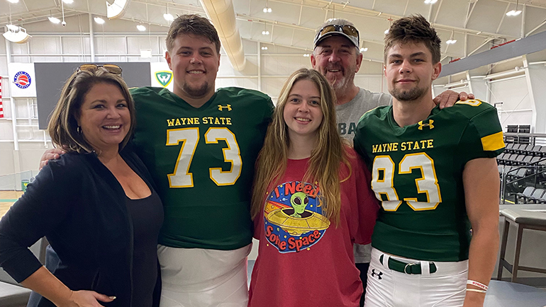 Brothers Noah Nicklin (73) and Max Nicklin (83) are teammates on the Wayne State football team. They credit their success to the support of their family (L-R), mom, Karen, sister, Natalie, and dad, Thomas.