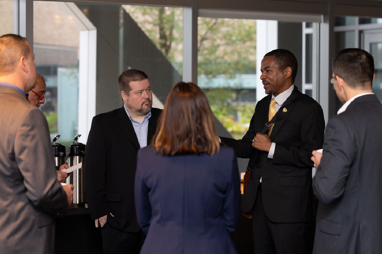 Ezemenari Obasi, Ph.D., Wayne State’s vice president for research & innovation, talks with GVSC representatives