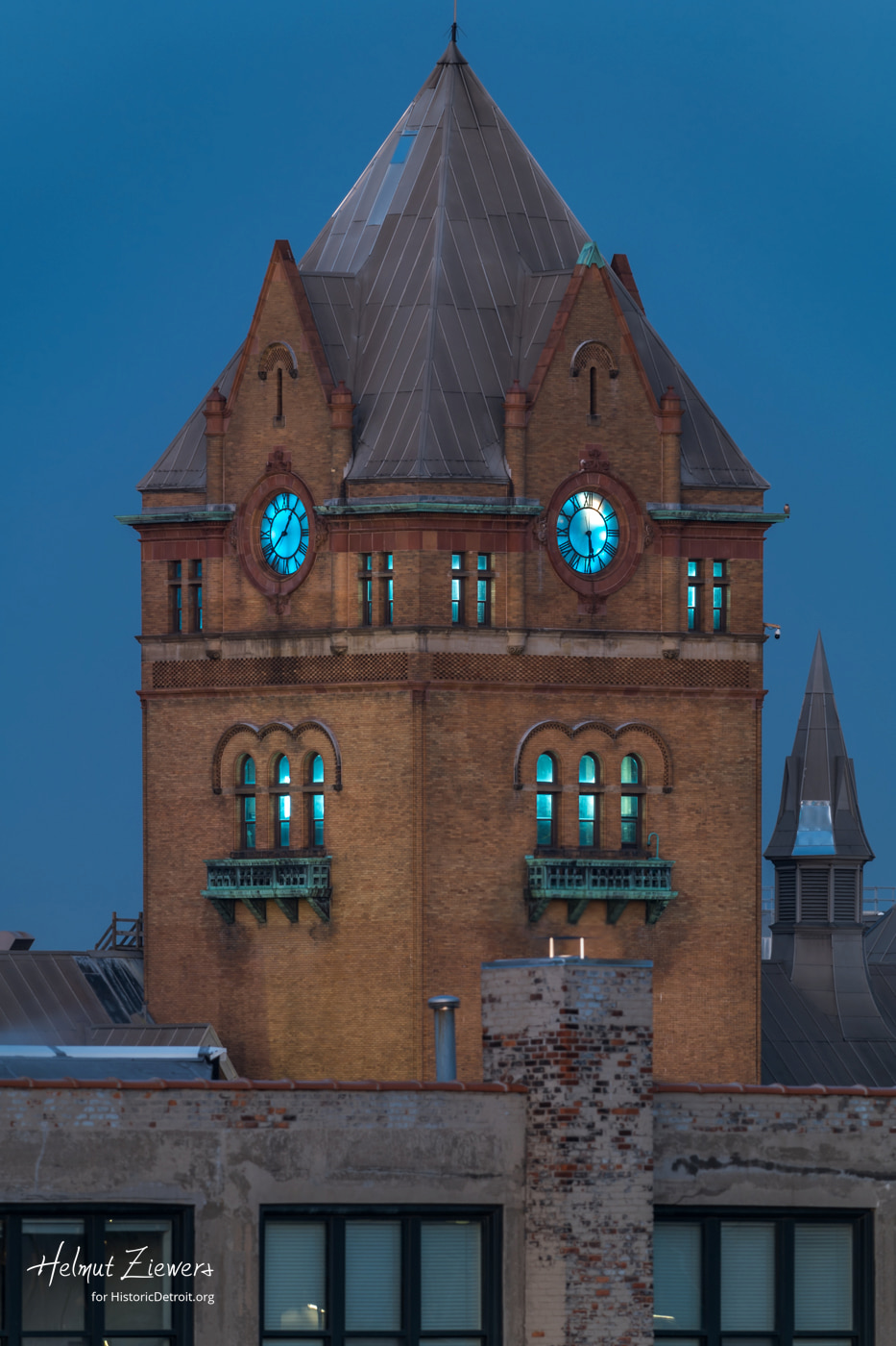 Old Main in Lions blue lights