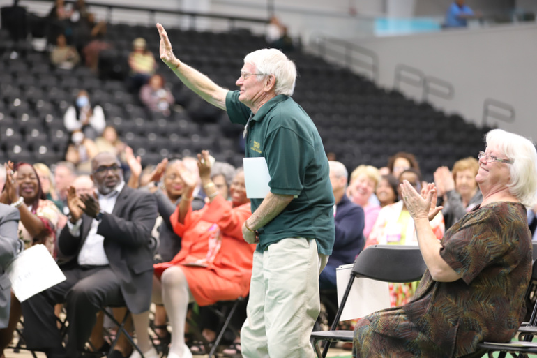 Peter Roberts waves to the crowd at the Employee Recognition Ceremony.