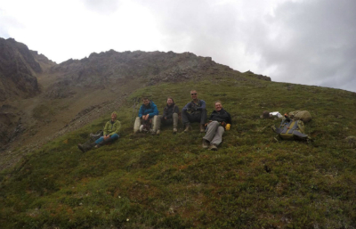 Students sitting on a mountain side