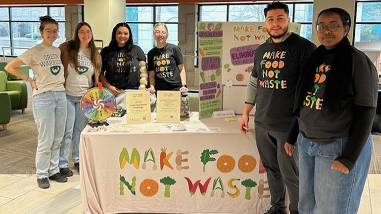 Members of Green Warriors, a student organization at Wayne State, set up an informational table at the Student Center Building on campus.