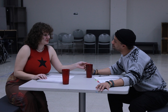 Quinn Jacob (Dee Dee) and Joey Taylor (Principal Hawkins) bring their characters to life during rehearsal